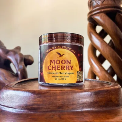 Jar of Dragon King Chocolate Moon Cherry pralines with a red and gold label